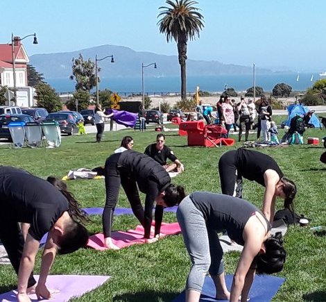 Presidio picnickers enjoy Off the Grid food trucks, kid-friendly art activities and free yoga classes. Consider it downward dog with bay views. (Courtesy of Angela Hill)
