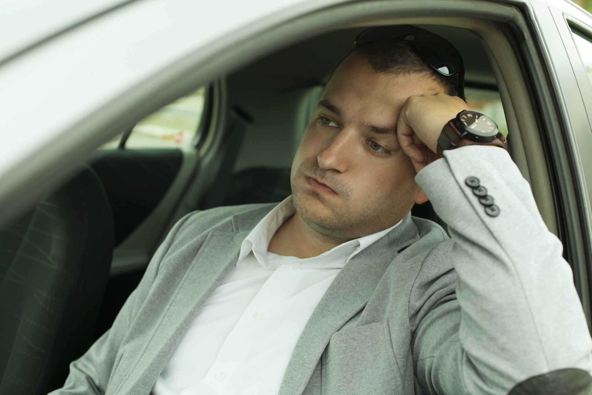 businessman late for work because of traffic jams